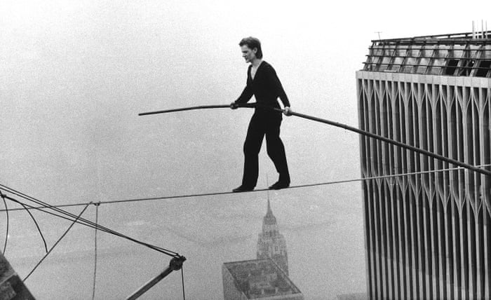 Philippe Petit tightrope walking between the World Trade Center towers, 1974