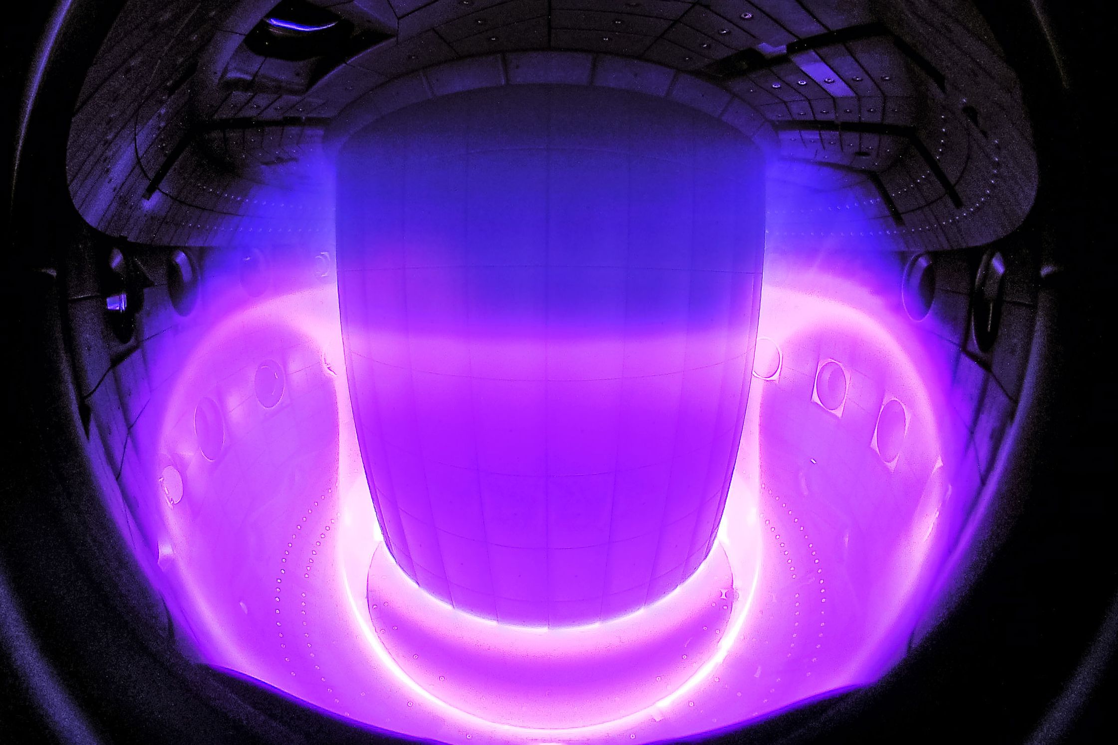 Purple plasma inside a nuclear fusion reactor
